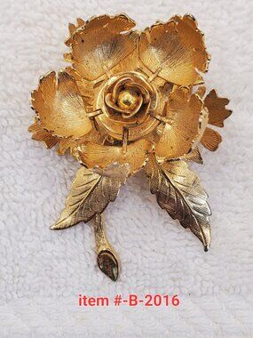 1 Gold Brooch, item # B-2016, wt. 26 grams.